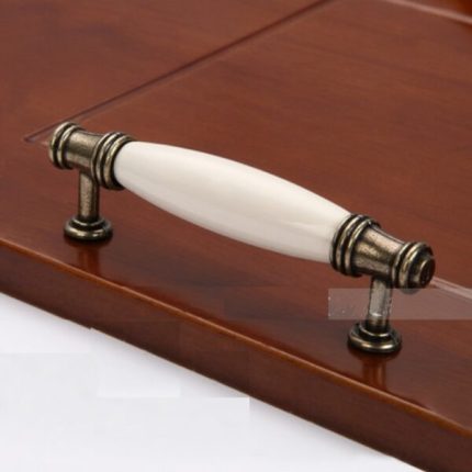 Tay nắm tủ gốm sứ trắng trơn màu đồng AIQI1205
